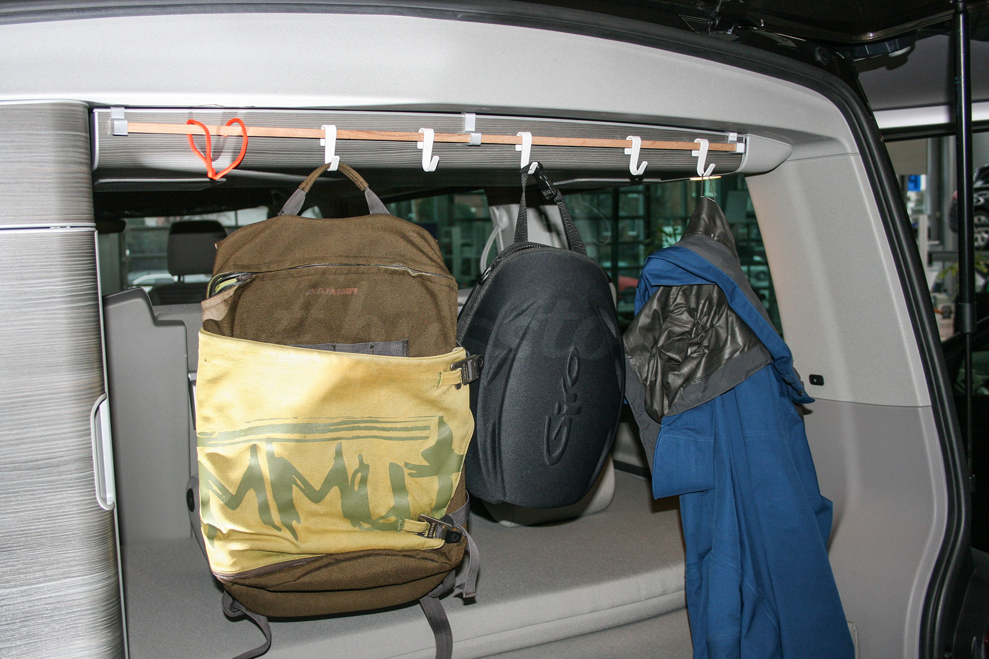 Roof storage compartment clothes rail (previous version) with camping equipment