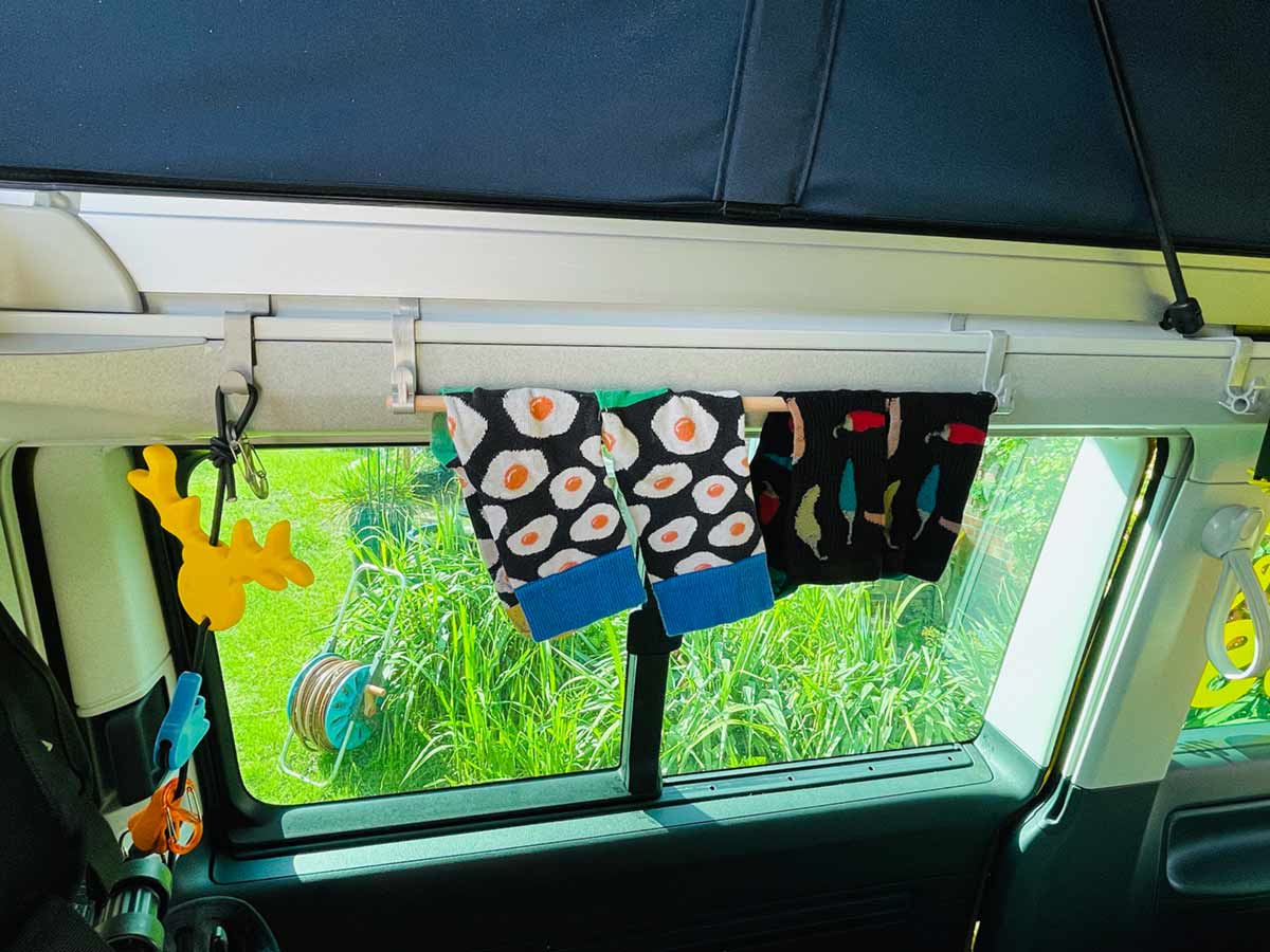 Clothes rail on two HANGING Cali hooks with socks